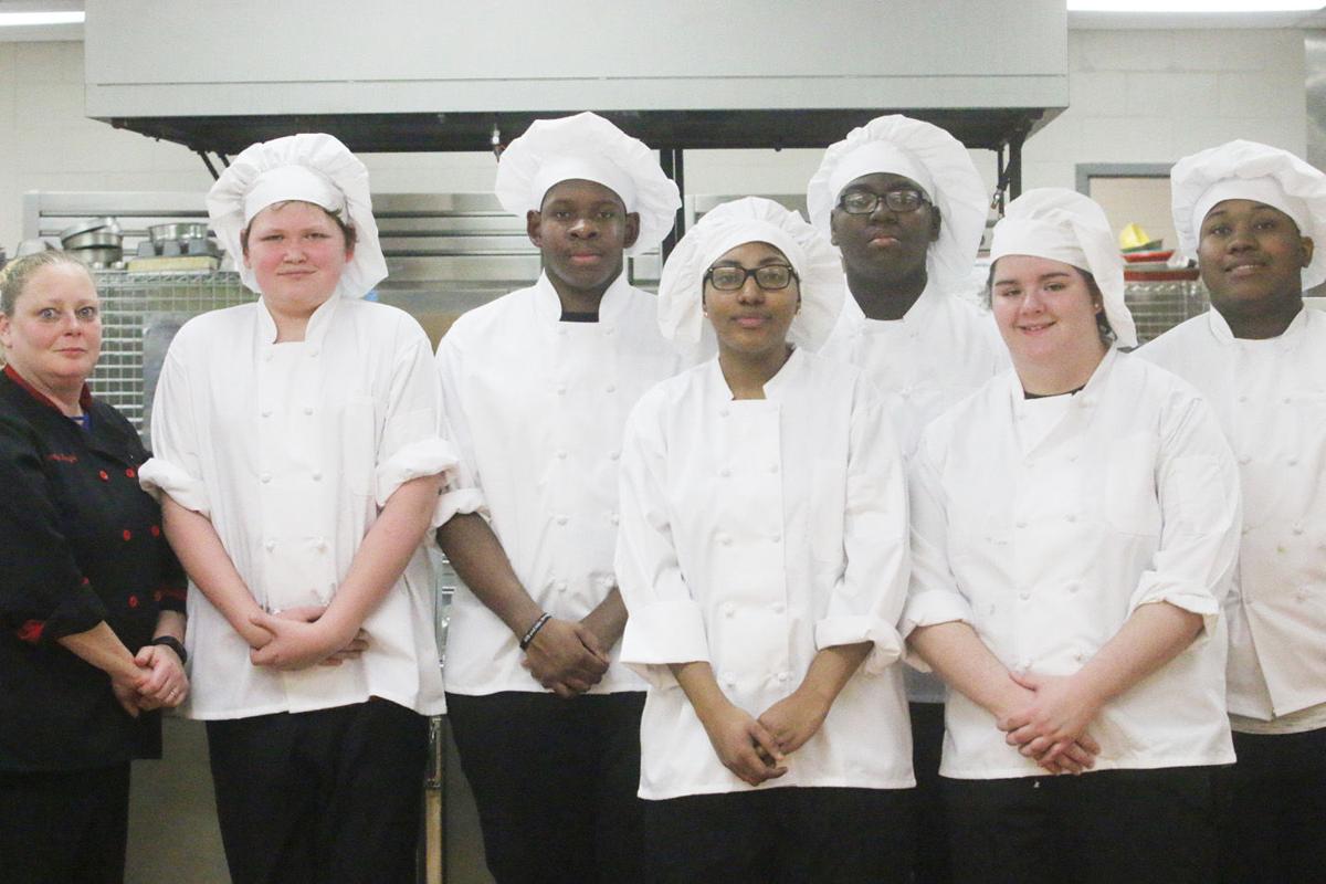 Culinary Chef Jennifer Ferguson, left, with her Culinary Arts students.